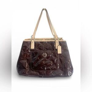 Coach Peyton embossed patent leather tote chocolate  brown color with tan trim.